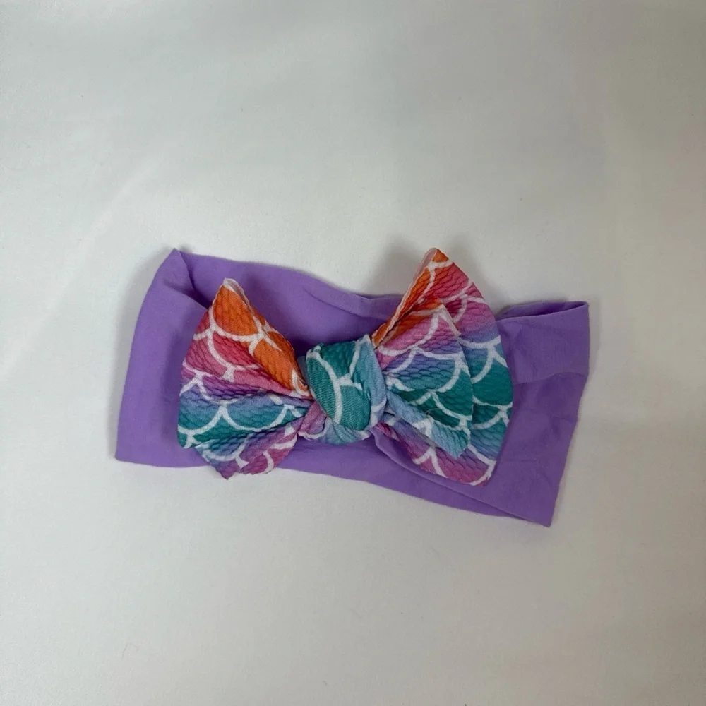 Vibrant Purple and Orange Hair Bow Accessory